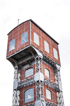 One of the two revitalized towers of the former hard coal mine in Świętochłowice. Towers of KWK Poland. Brick facade and steel support structure.