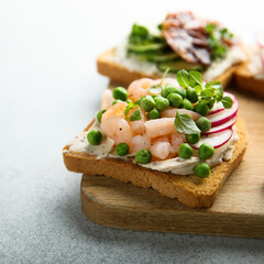 Shrimp toast with cream cheese, radish and green pea