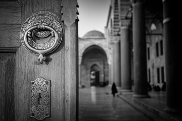 Fatih mosque door to the inner courtyard black and white