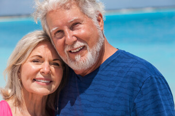 Portrait of retired seniors together on beach resort