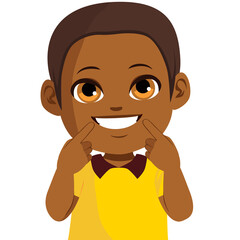 Young cute boy smiling showing his clean smile pointing fingers at mouth