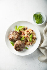 Beef burgers with basil and sun dried tomatoes