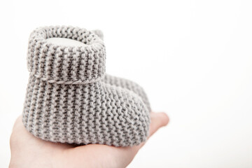 image of baby socks hand white background