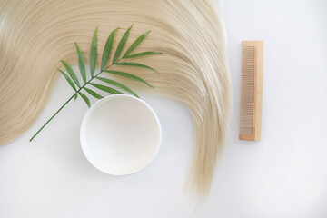 long curls, balm or hair mask isolated on white background. Concept hairdresser spa salon. hair...