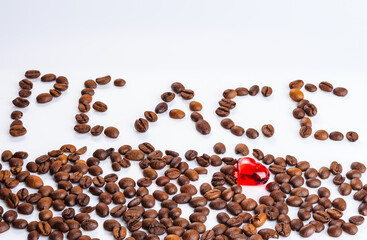 peace is lined coffee beans. Love coffee concept. grains of coffee isolated on white backgroundhite