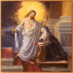 Tuinposter BARI, ITALY - MARCH 3, 2022: The painting of apparition of Heart Jesus to St. Theresa of Avila in the church Chiesa di Sacro Cuore from 20. cent. © Renáta Sedmáková