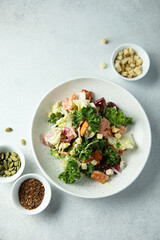 Kale salad with hot smoked salmon