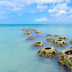 Travel background with Caribbean sea and rock stones.