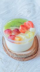 Fruit fresh mixed tropical fruit salad. Bowl of healthy fresh fruit salad