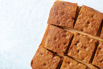 Blondie brownie dessert bars with chocolate chips, shot from the top with a place for text