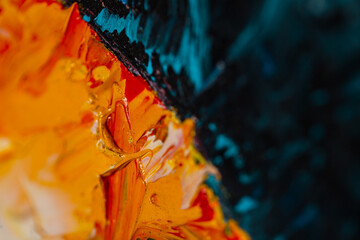 Cool dark colorful background with oil paint, yellow and blue color, closeup. Art strokes and texture