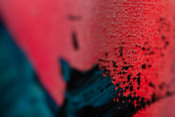 Beautiful dark colorful background with blue and pink oil paint ink, macro. Colored art texture