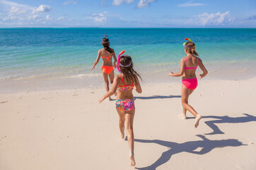 Young Caucasian girls in swimwear happiness beach holiday