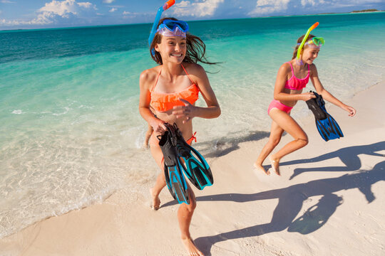 Young Caucasian children in swimwear on beach holiday