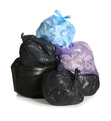 Trash bags full of garbage on white background
