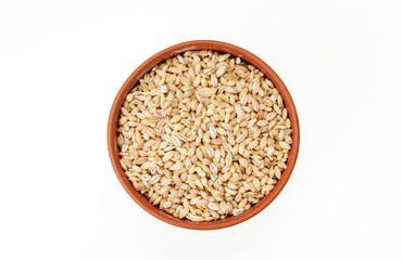 Barley groats in bowls and bags isolated on a white background. High quality photo