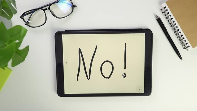 No, I do not agree. Choice negative. I refuse. Write note on tablet screen. Electronic pencil for widget notes. Modern reminder on screen. Top view of white desktop in office. Screen glasses. disagree