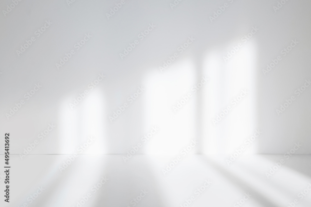 Poster Abstract white studio background for product presentation. Empty room with shadows of window. Display product with blurred backdrop. Soft focus