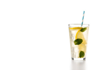 Glass of fresh lemonade isolated on white background. Copy space