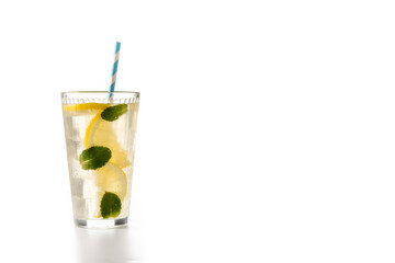 Glass of fresh lemonade isolated on white background. Copy space