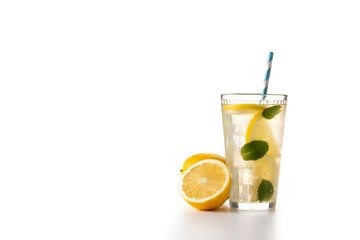 Glass of fresh lemonade isolated on white background. Copy space