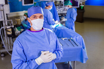 Obraz na płótnie Canvas Portrait of Caucasian male doctor in hospital PPE