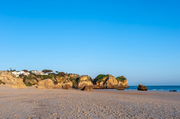 Fototapeta na wymiar Praia dos Tres Irmaos in the Algarve in Portugal