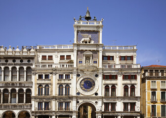 Clock tower of St. Mark at square of St. Mark in Venice. Region Veneto. Italy