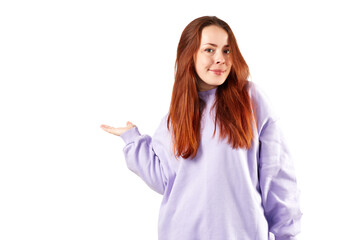 Caucasian woman in violet sweatshirt. Natural look. Smiling. long red hair. White background