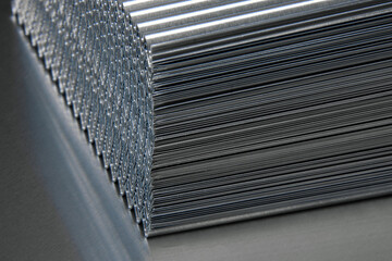 shiny waves of metal. bent aluminum foil. macro photo of corrugation