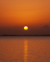 Fototapeta na wymiar Tropical ocean sunset over water travel tourism USA