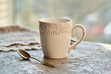 Cup of tea with a spoon