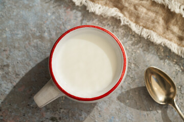 Probiotic kefir in a ceramic cup on a table