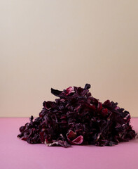 herbal tea, dry hibiskus flower, immune booster in color background © Larisa