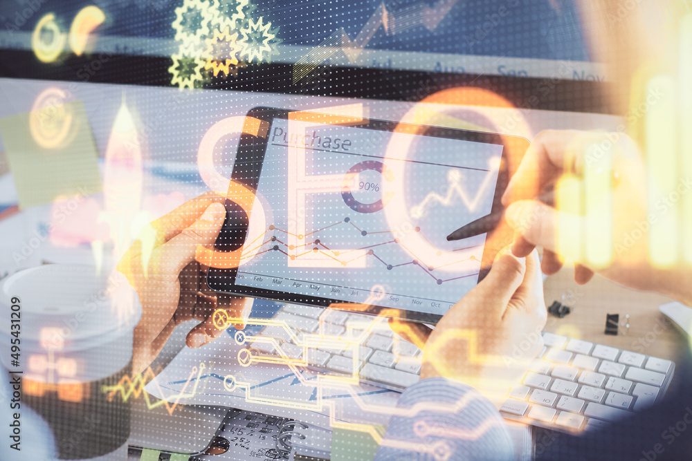 Poster multi exposure of man's hands holding and using a digital device and seo drawing. search optimizatio