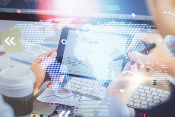 Multi exposure of man's hands holding and using a digital device and map drawing. International business concept.