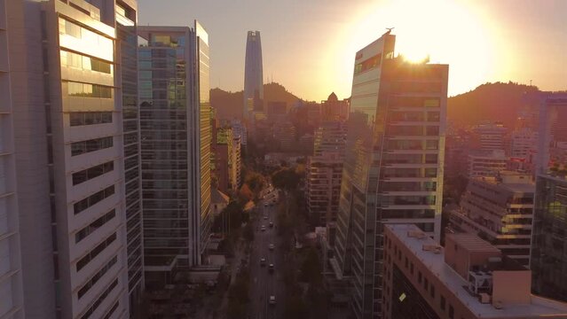 Isidora Goyenechea street or avenue in Santiago de Chile with its modern buildings in a warm sunset