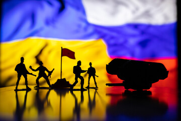 War between Russia and Ukraine, conceptual image of war using chess board, warring soldiers and...