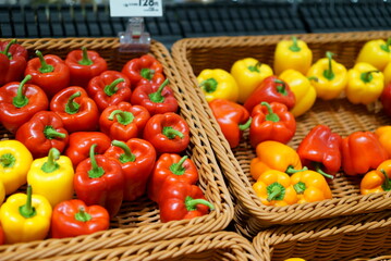 Basket with red and yellow paprika
