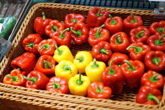 Basket with red and yellow paprika