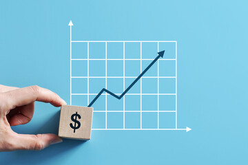 The dollar icon and the upward growth chart. Symbol of dollar growth
