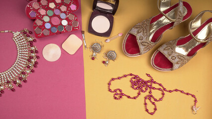 Bridal wedding jewelry and shoes, make up accessories on beautiful background. Top view, Space for...