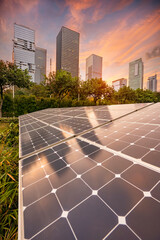 Solar panel with city twilight architecture electric energy light background,clean Alternative...