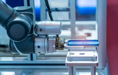 intelligence machine working in mobile phone factory,Smart factory industry 4.0 concept.