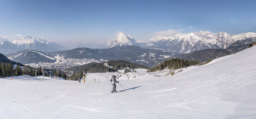 mountain winter landscape with very large ski run at Rosshutte  from above , Seefeld, Austria