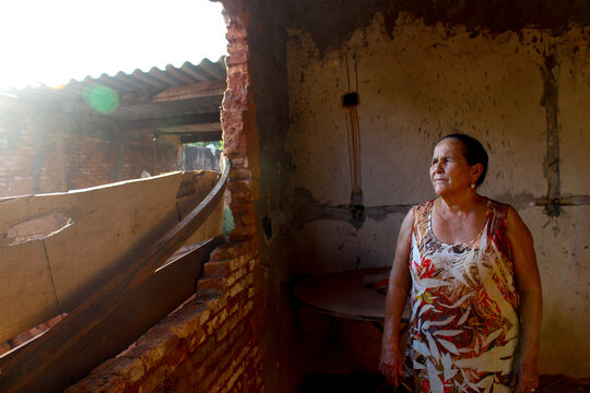 portrait of an elderly woman in her house