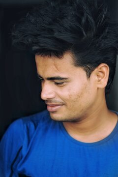 Portrait of South Asian man looking at his right
