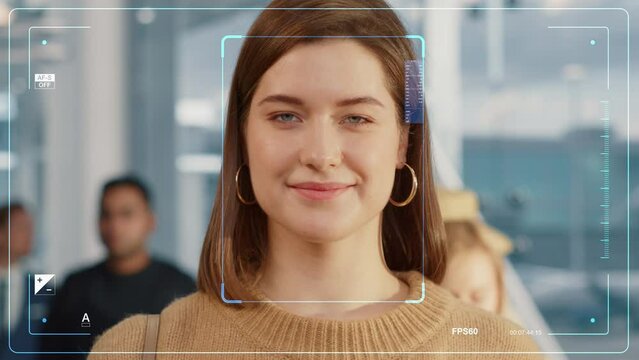 Beautiful Female Proceeds Through Automated Passport Border Control with Identity Face Recognition Scanner at International Airport. Footage Showing Biometric Facial Recognition Scanning Process.