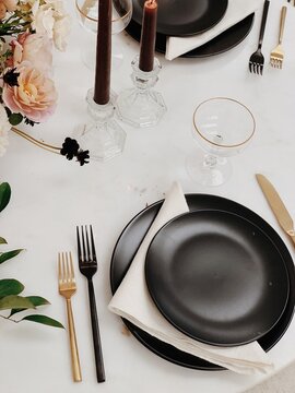 Prepared dinner tableware on light textile