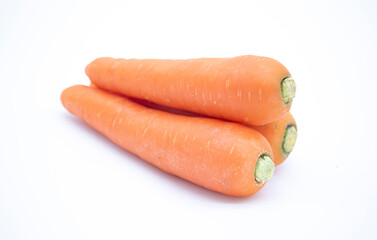 fresh three Carrots close up isolated on white background